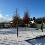 Playground of the farm kindergarten in the snow
